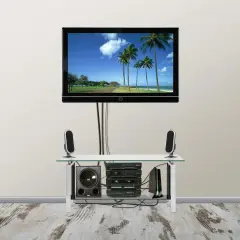 Telewizor na uchwycie obrotowym w salonie, z systemem audio. Jak poprowadzić zasilanie, by estetycznie ukryć kable.