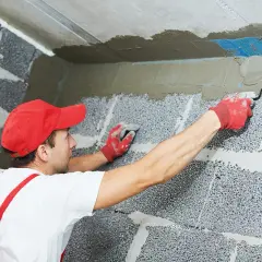 Jak nakładać tynk na ścianę - kluczowe kroki do perfekcyjnego wykończenia