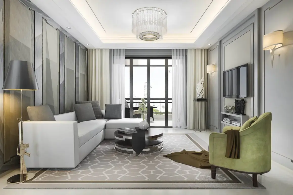 Nowoczesny salon z białym narożnikiem, zielonym fotelem i geometryczną tapetą. Czy sufit podwieszany w salonie o wysokości 250 cm to dobry pomysł? Tak, dodaje elegancji.