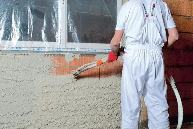 Zdjęcie Ile kosztuje m2 tynku maszynowego? Ceny, rodzaje i wpływ czynników